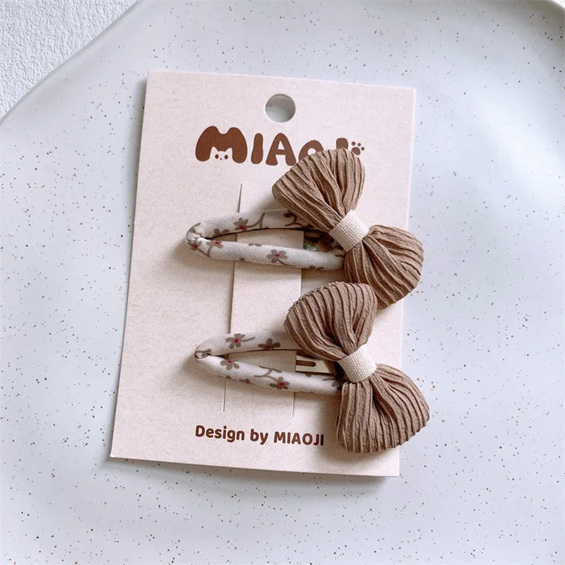 Materiałowe spinki do włosów 3D