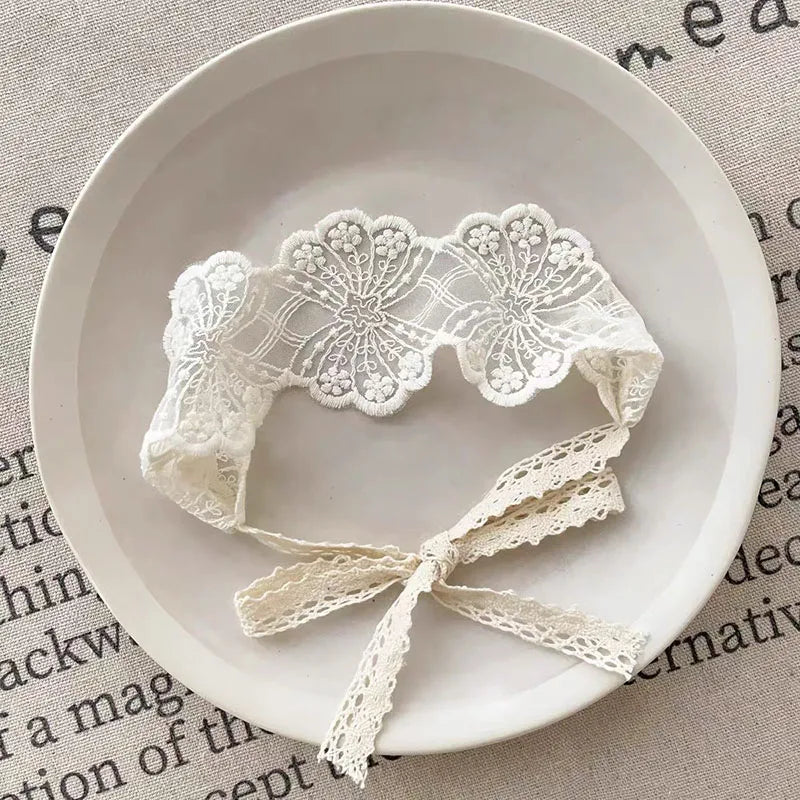 Koronkowe opaski wiązane dla niemowląt w stylu vintage