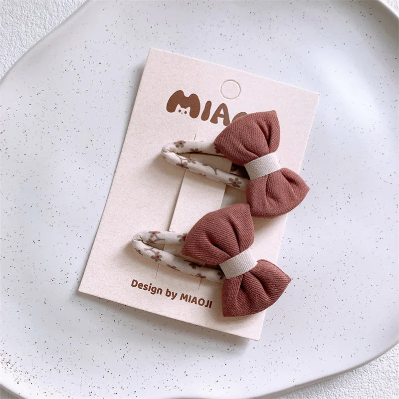 Materiałowe spinki do włosów 3D